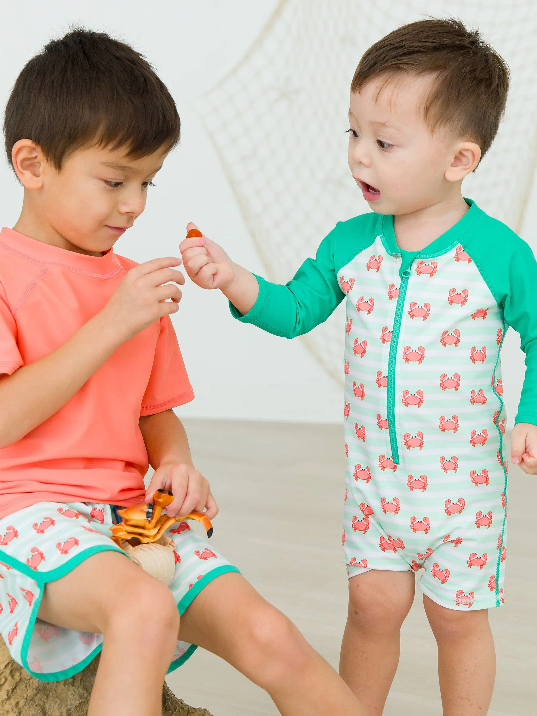 RuffleButts   RuggedButts - Boys Crabby Cove Dolphin Hem Swim Trunks